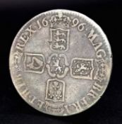 A 1696 William III Silver Crown Coin. VF grade but please see photos.