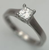 A 950 Platinum and Diamond Solitaire Ring. A 0.40ct Princess cut diamond having G colour and VS2