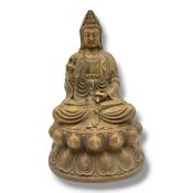 An antique Bronze Figure of Guanyin, Bearing a Xuande Markings on base. Finely cast seated in