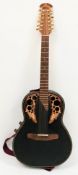 A beautifully preserved Ovation Adamas 11, 1685-5 12 string acoustic/electric guitar. Serial