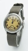 A Vintage Waltham WW2 Era Pilots Watch. Textile strap. Stainless steel case - 31mm. Patinaed dial