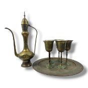An antique Middle Eastern Brass Coffee Service Set comprising a lidded ewer, circular tray and