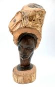 A vintage hand-carved Tribal wooden sculpture from a solid wood trunk. Height 28cm. Please see