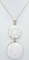 A 925 silver necklace with a dual-disc pendant. Total weight 21g. Approx 84cm length with a 7cm