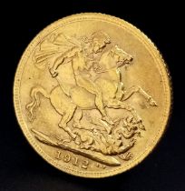 A 1912 George V Full Gold Sovereign Coin. 22K gold. EF.