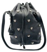 A Black Yves Saint Laurent Heart Studded Tote Bag. Black leather exterior with silver-toned heart-