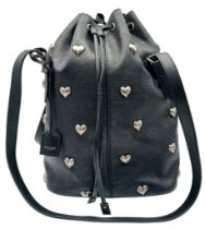 A Black Yves Saint Laurent Heart Studded Tote Bag. Black leather exterior with silver-toned heart-
