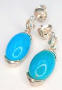 A Pretty Pair of 925 Sterling Silver Turquoise Set Drop Earrings - 2.2cm drop. Each earring is set