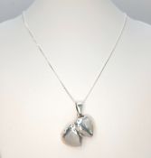 A 925 Sterling Silver Heart Locket Pendant Necklace - 46cm length. The necklace is fitted with a