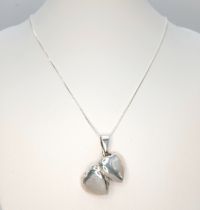 A 925 Sterling Silver Heart Locket Pendant Necklace - 46cm length. The necklace is fitted with a