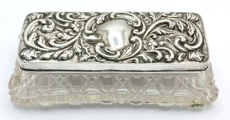 An Edwardian Sterling Silver Mounted Cut Glass Trinket Box. The rectangular cut glass box with a