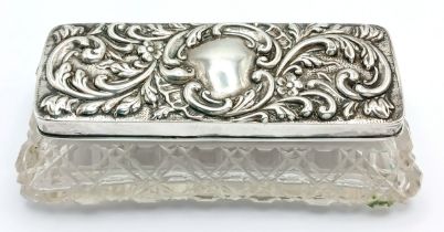 An Edwardian Sterling Silver Mounted Cut Glass Trinket Box. The rectangular cut glass box with a