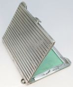 A Hallmarked Sterling Silver Double Photograph Frame Pendant. The rectangular frame has an engine-