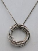 A 925 Sterling Silver Circular Pendant Necklace. 46cm necklace. Pendant measures 2cm. 8g total