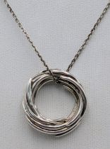 A 925 Sterling Silver Circular Pendant Necklace. 46cm necklace. Pendant measures 2cm. 8g total