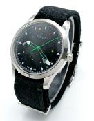 A Gucci G - Timeless Dial Space Watch. Black textile strap. Stainless steel case - 39mm. Black