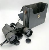 A Pair of Vintage Mark Scheffel Triple Tested Binoculars.