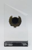 An Acrylic Trophy in Presentation Box. Features a clear acrylic plaque with a laurel wreath and