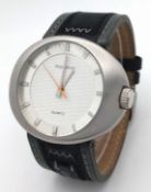 A vintage Impulse quartz wristwatch, featuring an oversized, 47mm, horizontal oval shaped brush