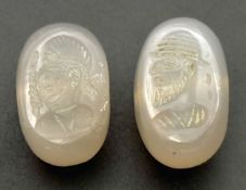 A Pair of Agate Intaglio Seals. May have been worn as amulets due to holes for stringing. 25mm x