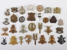 Grouping of mainly British Military Badges.