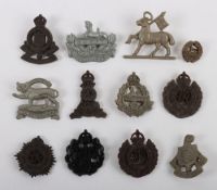 Grouping of WW2 Plastic Economy Cap Badges.
