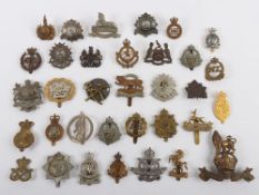 Grouping of Mainly British Military Cap Badges