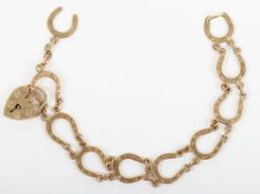 A 9ct gold horseshoe link bracelet, 18cm, 9.69g
