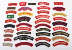 Large Selection of Mainly British Military Cloth Shoulder Titles. Examples included are a WW2...