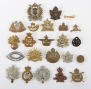Assortment of Post 1920s Canadian Cap, Collar badges & Shoulder Titles.