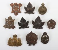 Collection of Canadian WW1 C.E.F Cap & Collar Badges. Included within this lot are Examples of the