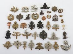 Small job lot of British Military Cap badges. Lot includes The Royal Warwickshire Regiment,