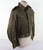 7th Armoured Denim Blouse. Green denim blouse with makers label inside size 4 with arrow dated 1951,