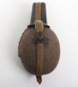 WW2 German Army Water Bottle. A fine example being alloy bottle stamped to top rim ESB42 covered