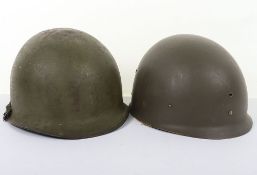 U.S.M1 Combat Helmet. Rear seam helmet with painted green finish with much wear to shell and rank