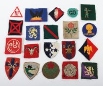 Grouping of British Army Formation Signs.Â Included in this lot are badges for the 76th