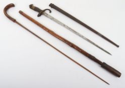 Sword Stick and French Gras Bayonet. A fair example of an period sword walking stick. Arched