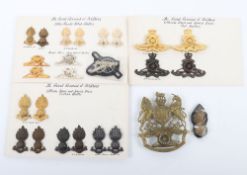 Grouping of Cap Badges & Collars in cloth metal & Anodised to the Royal Regiment of Artillery.