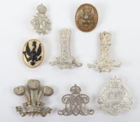 Collection of Cavalry Arm Badges. Lot includes examples of The Queen's Dragoon Guards,14th Kings