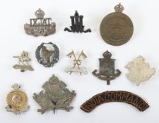 Fine Assortment of Indian Cap Badges and a Cloth Shoulder Title.