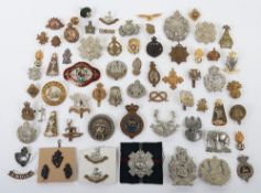 Large Assortment of British Military Cap, Collar Badges. Items included are The Light Infantry