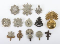 Assorted British Army Territorial Cap Badges. Lot includes the 6th Battalion Hampshire Regiment