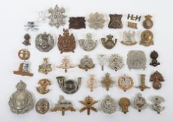 Collection of British Military Cap Badges. Lot includes examples of the Royal Fusiliers, The