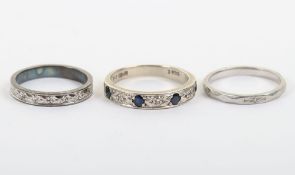 Three rings including a Platinum, a 9ct and a silver ring,