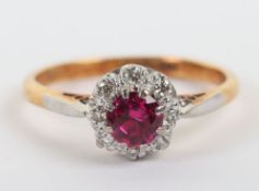 An 18ct synthetic ruby and diamond cluster ring,