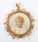 A 9ct gold portrait miniature of a child,