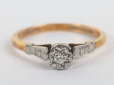 An 18ct gold and platinum solitaire diamond ring,