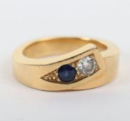 A substantial 18ct diamond and sapphire ring,