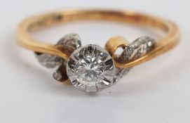 An 18ct gold and platinum solitaire diamond ring,