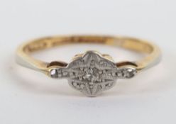 An 18ct and platinum diamond ring,